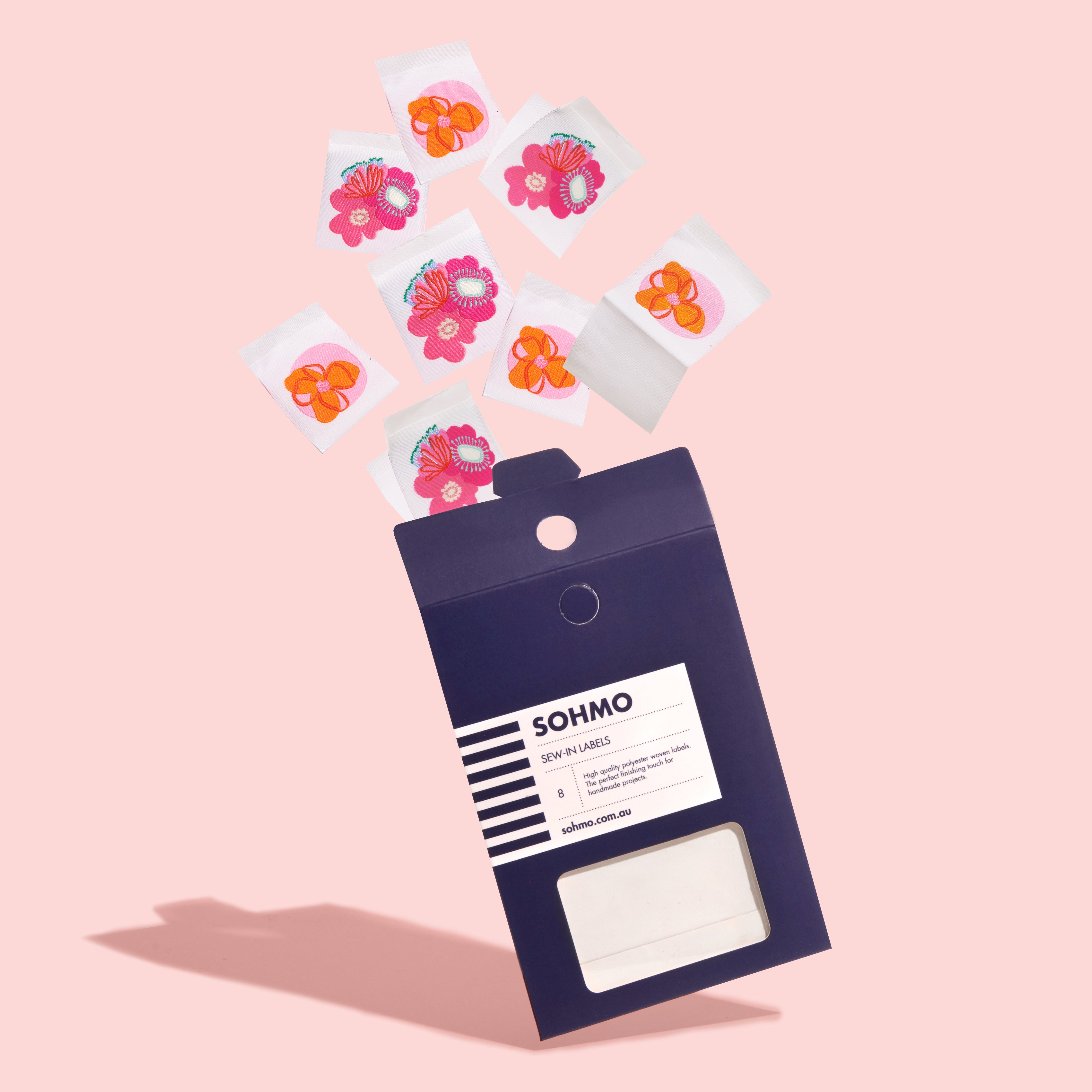 A packet of SOHMO Pink Blooms Sew-in clothing labels
