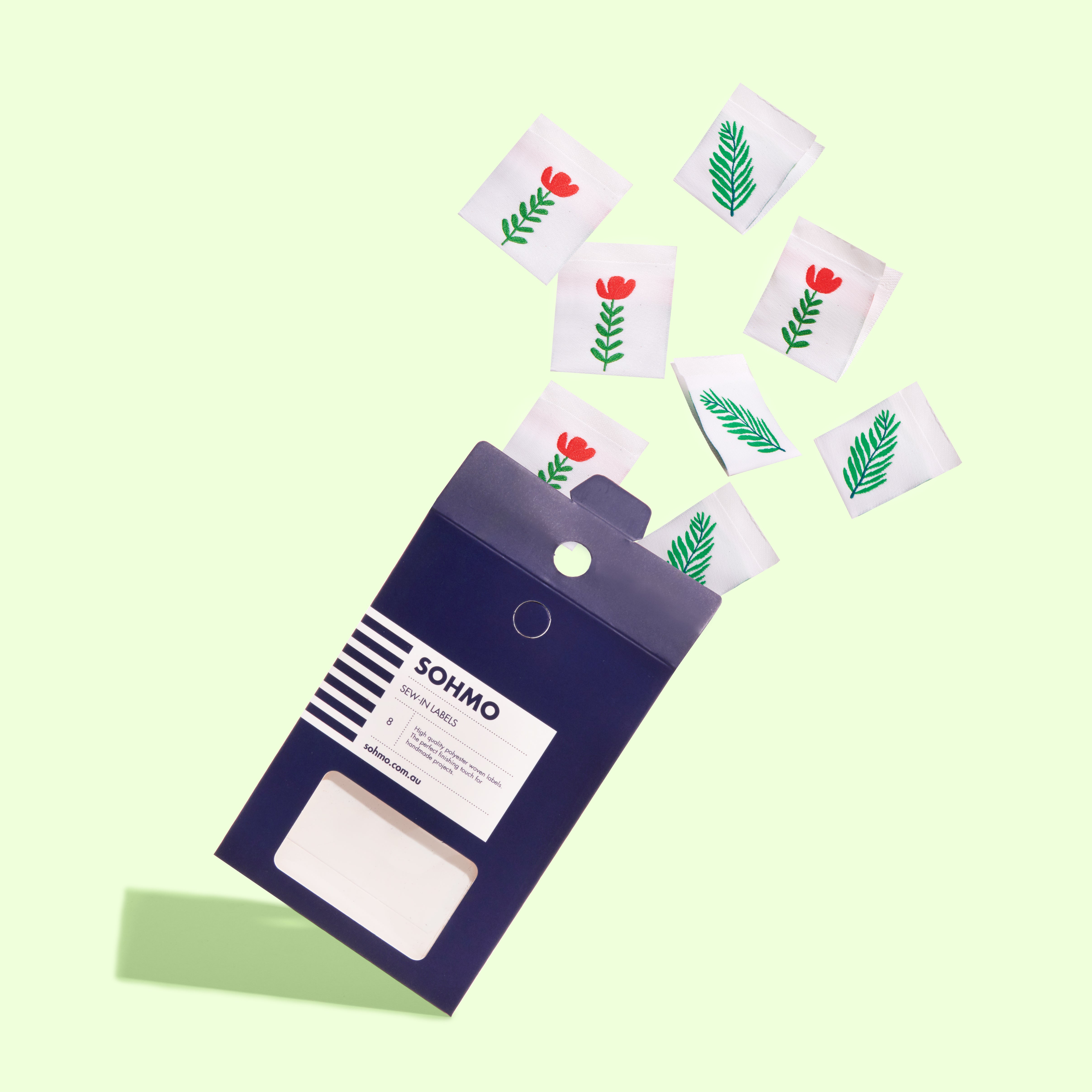 A pack of SOHMO Sew-in clothing labels with green foliage