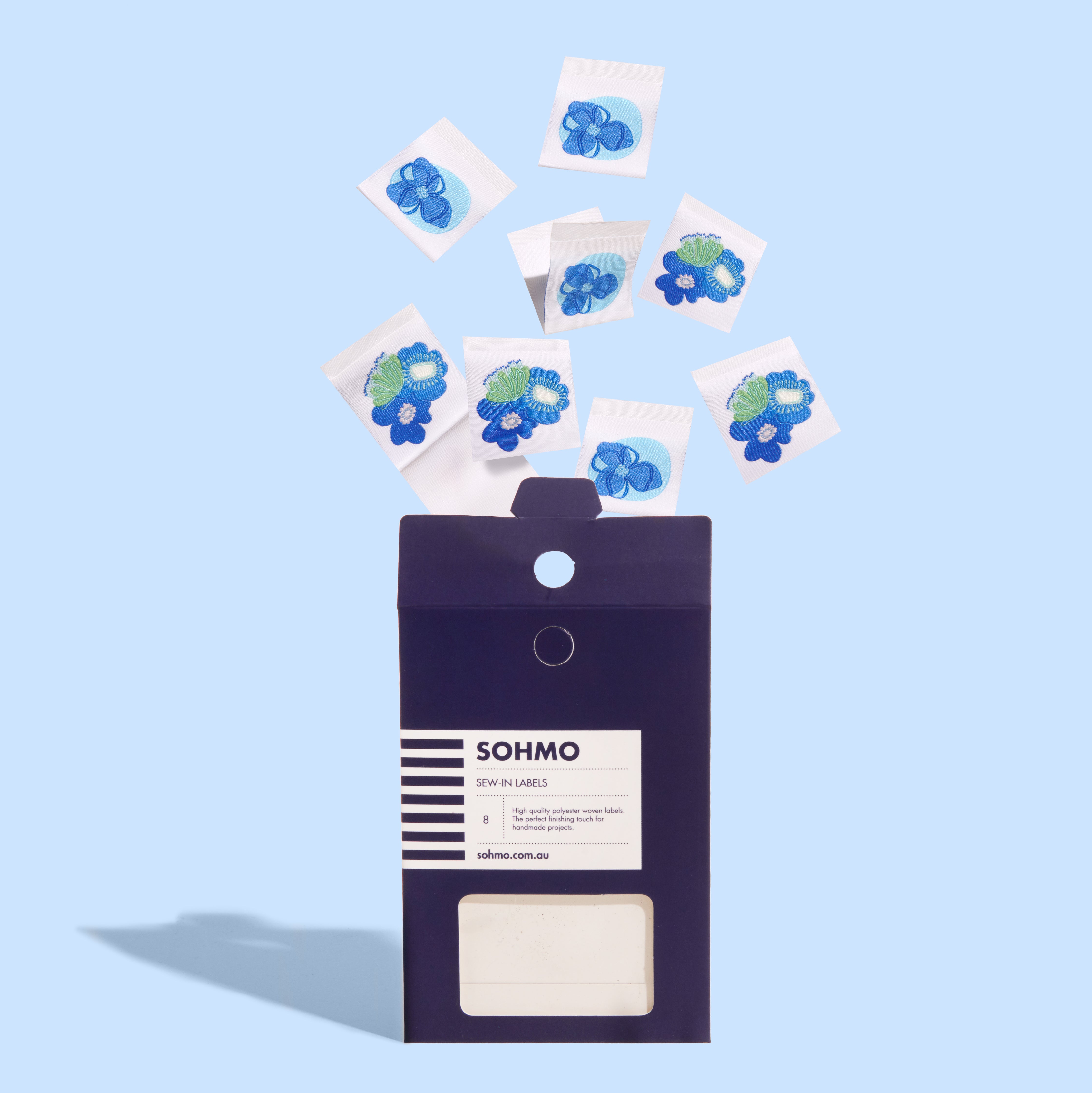 A packet of SOHMO blue blooms sew in clothing labels