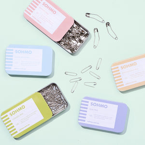 SOHMO pins in reusable tins with sliding lid