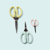 Three different sized pairs of SOHMO go-to craft scissors. They feature a microserrated blade and flexible silicone handles